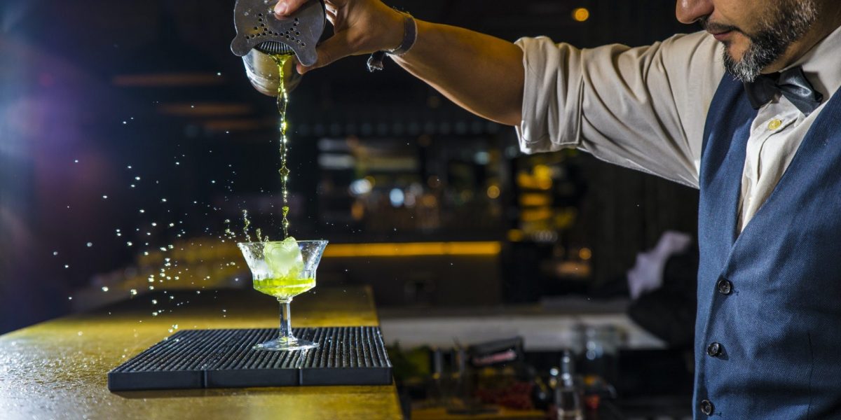 barman-is-making-cocktail-at-night-club-1.jpg